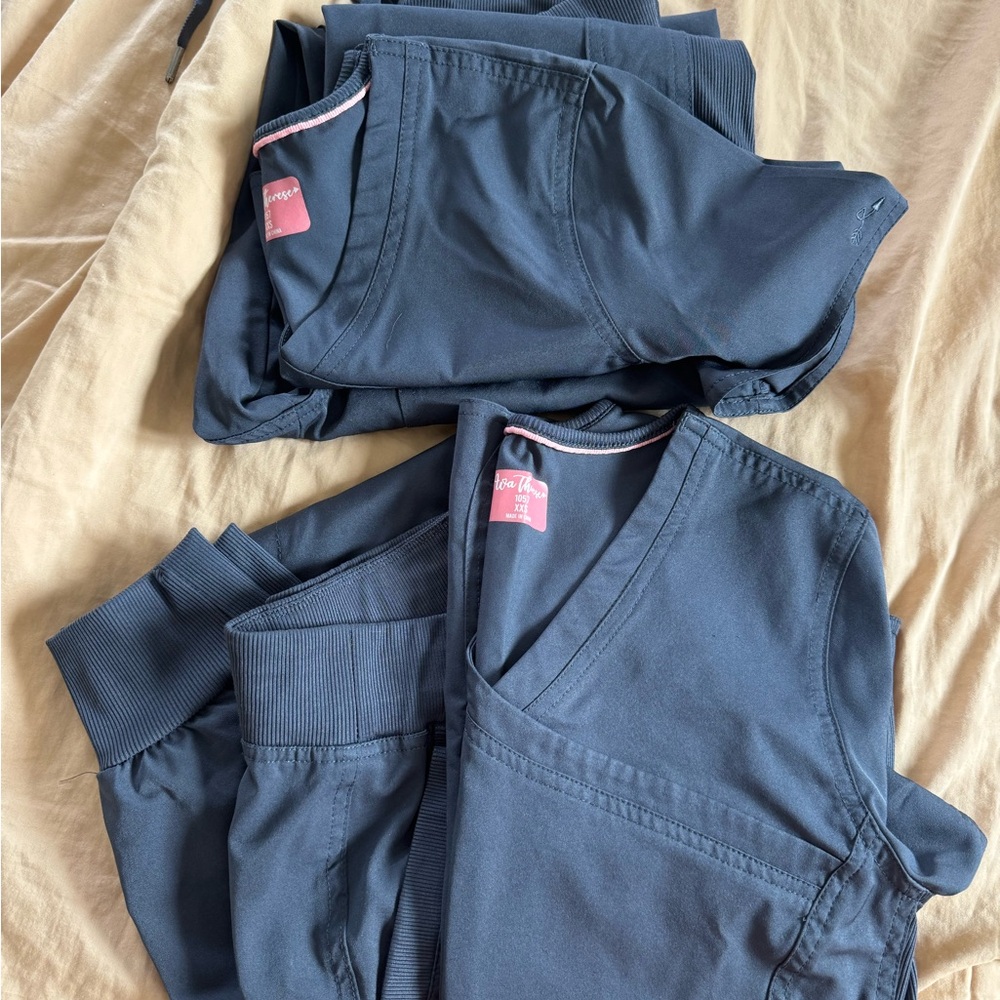 2 sets of grey Scrubs